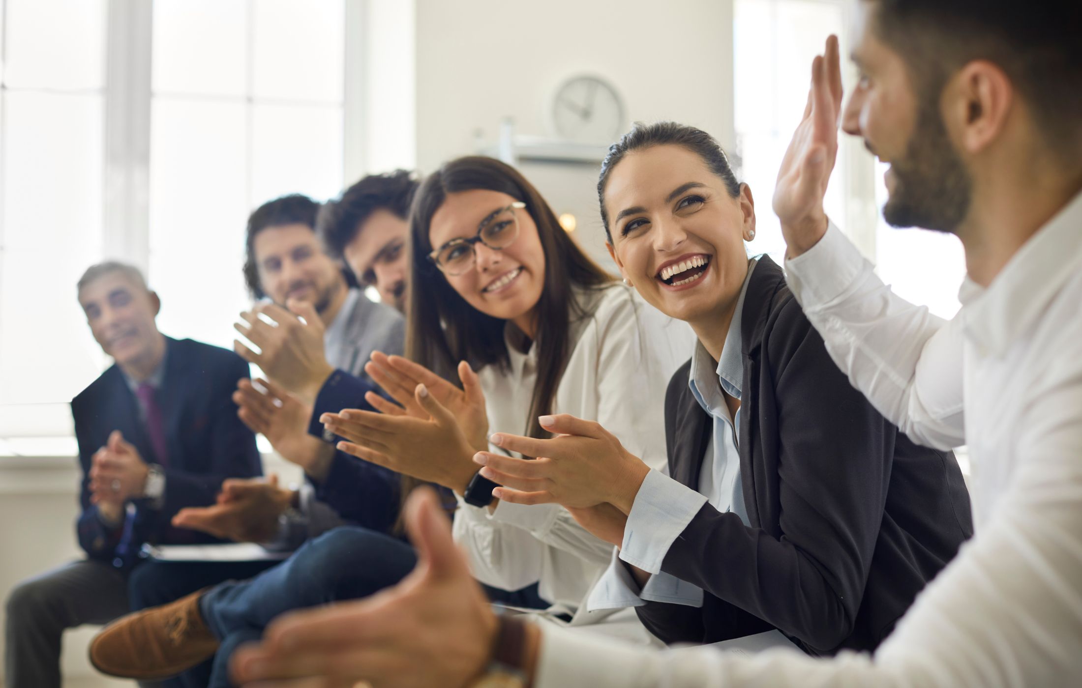 People in a Meeting Clapping